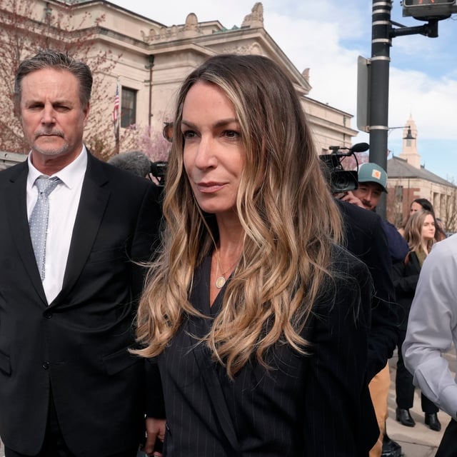 Karen Read departs Norfolk Superior Court following a day of jury selection, Wednesday, April 17, 2024, in Dedham, Mass. Read is accused of running into her Boston police officer boyfriend with her SUV in the middle of a nor'easter and leaving him for dead after a night of heavy drinking. (AP Photo/Steven Senne)