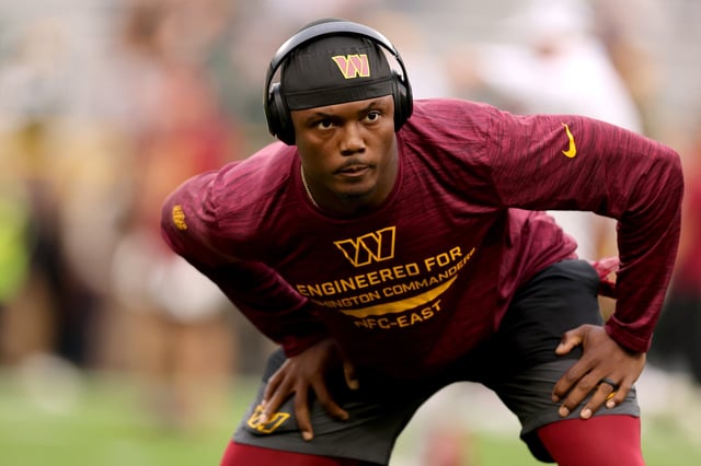 Terry McLaurin #17 of the Washington Commanders warms up prior to the game against the Green Bay Packers at Lambeau Field on September 11, 2025 in Green Bay, Wisconsin.