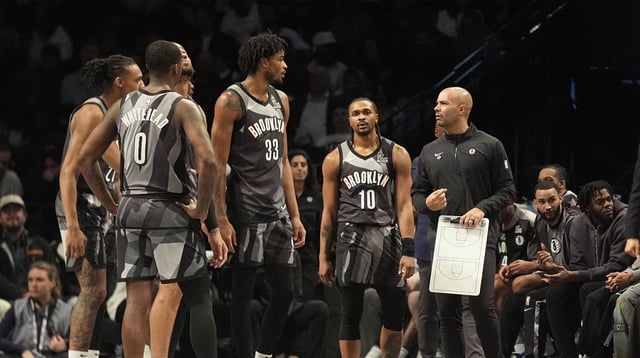 Apr 3, 2025; Brooklyn, New York, USA; Brooklyn Nets head coach Jordi Fernandez speaks to his players at a break in the action during the first half against the Minnesota Timberwolves at Barclays Center. Mandatory Credit: Gregory Fisher-Imagn Images