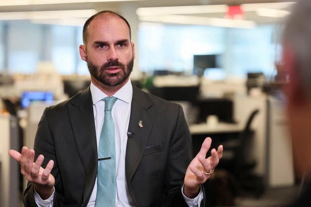 Brazilian lawmaker Eduardo Bolsonaro sits down with Reuters to discuss his efforts to put U.S. pressure on Brazil to halt the trial of his father, right-wing former Brazilian President Jair Bolsonaro, in Washington, D.C., U.S., August 14, 2025. REUTERS/Jessica Koscielniak/ File Photo