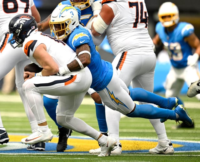 Denver Broncos quarterback Bo Nix is sacked by Chargers safety Derwin James Jr. during the first half on Sunday, Sept. 21, 2025, at SoFi Stadium in Inglewood. (Photo by Will Lester, Inland Valley Daily Bulletin/SCNG)