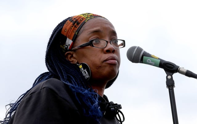 BOSTON MA. JANUARY 18: Activist Monica Cannon-Grant speaks during the Black Lives Matter MLK rally outside Madison Park High School on January 18, 2021 in Boston, MA.  (Staff Photo By Nancy Lane/MediaNews Group/Boston Herald)