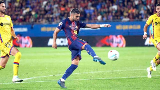 Barcelona’s Ferran Torres kicks the ball during the La Liga match between FC Barcelona and Getafe in Barcelona. (AP)