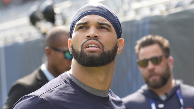 Sep 21, 2025; Chicago, Illinois, USA; Chicago Bears quarterback Caleb Williams (18) before the game against the Dallas Cowboys at Soldier Field. Mandatory Credit: David Banks-Imagn Images