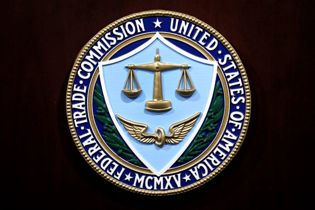The U.S. Federal Trade Commission seal is seen at a news conference in Washington, U.S., July 24, 2019. REUTERS/Yuri Gripas/File Photo