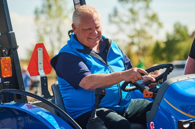 Ontario Premier Doug Ford plows a furrow with a tractor at the 2025 International Plowing Match in Grassie, Ont., on Tuesday, Sept. 16, 2025. 