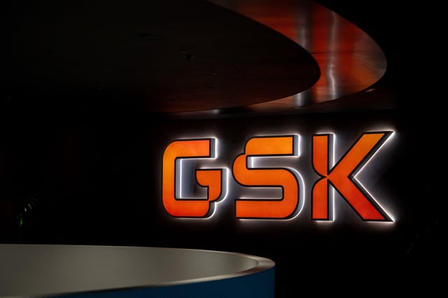 Signage is pictured in the main lobby of GSK offices in London, Britain, February 20, 2025. REUTERS/Chris J. Ratcliffe/ File Photo