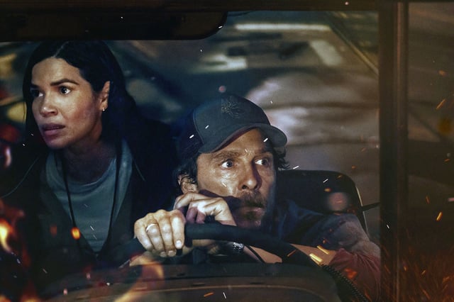 America Ferrara, left, and Matthew McConaughey are a teacher and schoolbus driver who flee the raging Camp Fire in “The Lost Bus.” 