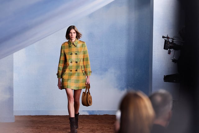 A model presents a creation at the Burberry catwalk show held during London Fashion Week in London, Britain, September 22, 2025. REUTERS/Isabel Infantes