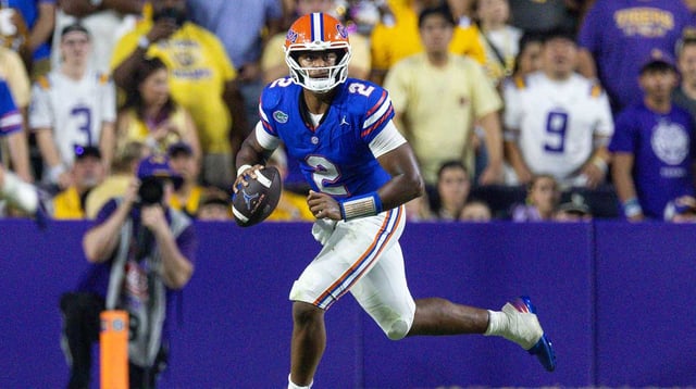 Sep 13, 2025; Baton Rouge, Louisiana, USA; Florida Gators quarterback DJ Lagway (2) scrambles out the pocket to pass against the LSU Tigers during the second half at Tiger Stadium. Mandatory Credit: Stephen Lew-Imagn Images