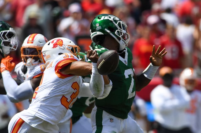 TAMPA, FLORIDA - SEPTEMBER 21: Antoine Winfield Jr. #31 of the Tampa Bay Buccaneers sacks Tyrod Taylor #2 of the New York Jets forcing a fumble during the second quarter at Raymond James Stadium on September 21, 2025 in Tampa, Florida.