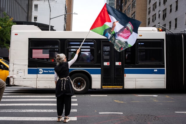 People protest the ongoing Israel Palestinian war outside the United Nations Headquarters during the 80th session of the U.N. General Assembly's discussion on a two-state solution, Monday, Sept. 22, 2025. (AP Photo/Angelina Katsanis)