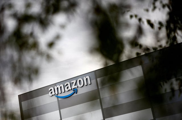 The logo of Amazon is pictured at the company logistics center in Carquefou near Nantes, France, October 15, 2024. REUTERS/Stephane Mahe/File Photo