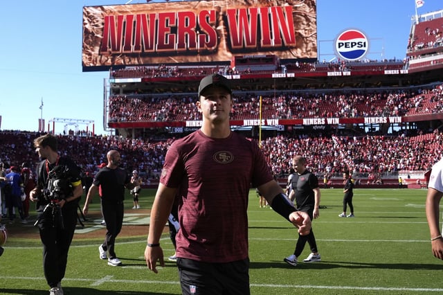 49ers quarterback Brock Purdy walks off the field after Sunday's 16-15 win over the Arizona Cardinals at Levi's Stadium, when he was ruled out of being the third emergency quarterback due to his toe injury. 