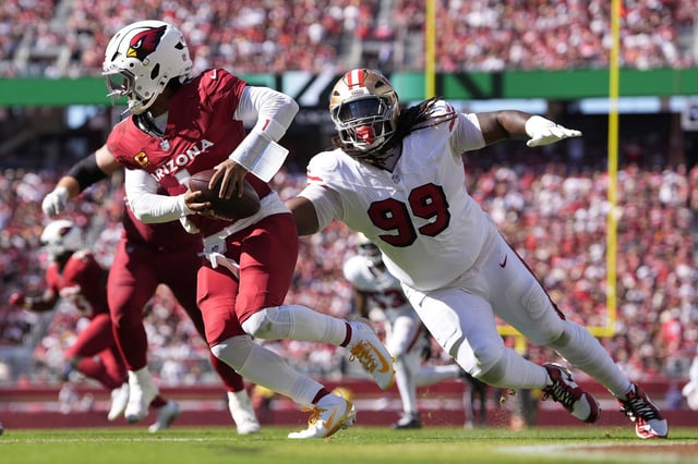 SANTA CLARA, CALIFORNIA - SEPTEMBER 21: Kyler Murray #1 of the Arizona Cardinals scrambles away from the pressure of CJ West #99 of the San Francisco 49ers during the fourth quarter at Levi's Stadium on September 21, 2025 in Santa Clara, California. (Photo by Thearon W. Henderson/Getty Images)