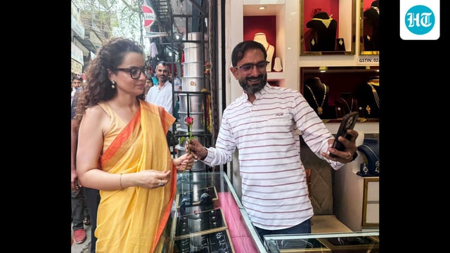 A man clicks a selfie with BJP MP Kangana Ranaut during her interaction with people on GST reforms, in Mandi on Monday. (ANI)