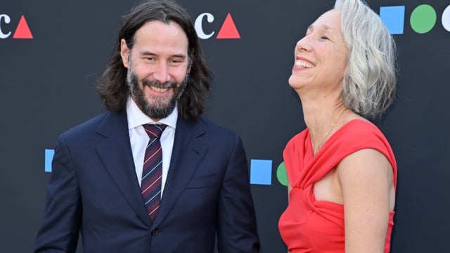 Keanu and Alexandra at an event