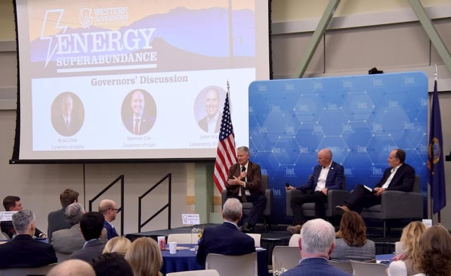 Idaho Gov. Brad Little, left, speaks while Gov. Spencer Cox and Idaho National Laboratory director John Wagner both listen during a panel discussion at the Energy Superabundance conference hosted by the Western Governors’ Association at Idaho National Laboratory in Idaho Falls Monday., Sept. 22, 2025.
