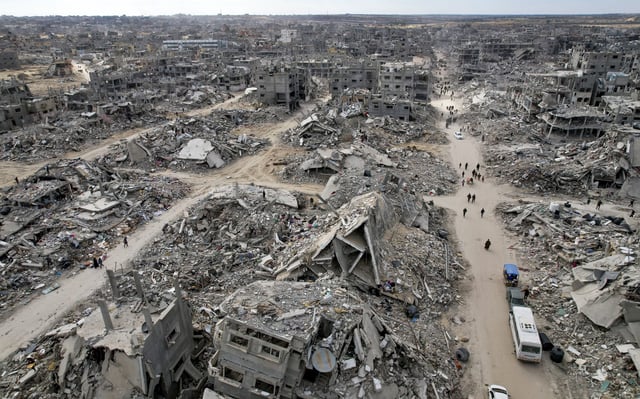 FILE - Displaced Palestinians return to Rafah, Gaza Strip, Jan. 20, 2025, a day after a ceasefire deal between Israel and Hamas went into effect. (AP Photo/Jehad Alshrafi, File)