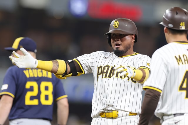 SAN DIEGO, CALIFORNIA – SEPTEMBER 22: Jose Iglesias #7 of the San Diego Padres reacts at first base after hitting an RBI single during the seventh inning of a game against the Milwaukee Brewers at Petco Park on September 22, 2025 in San Diego, California. (Photo by Sean M. Haffey/Getty Images)