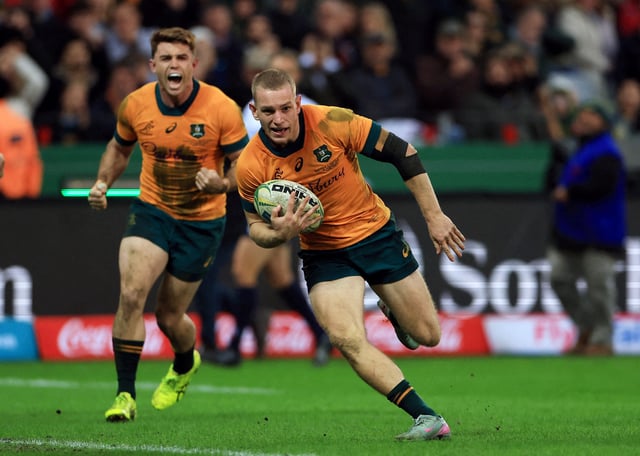 Rugby Union - Rugby Championship - South Africa v Australia - DHL Stadium, Cape Town, South Africa - August 23, 2025  Australia's Max Jorgensen scores a try REUTERS/Esa Alexander/File Photo