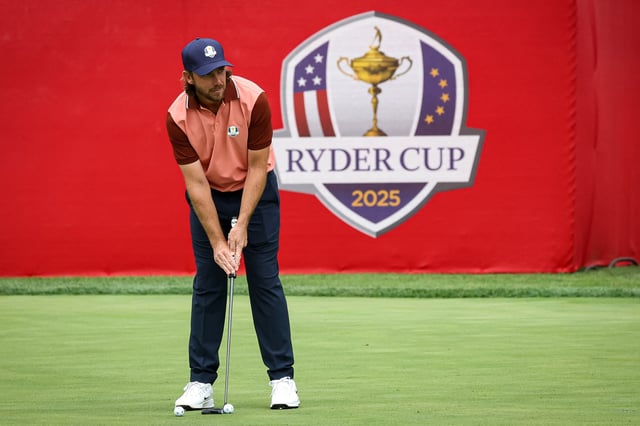 Golf - The 2025 Ryder Cup - Bethpage Black Golf Course, Farmingdale, New York, United States - September 22, 2025 Team Europe's Tommy Fleetwood practices on the putting green during arrivals day REUTERS/Brendan Mcdermid