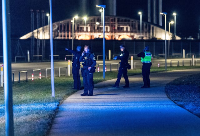 The Danish police are seen at Copenhagen Airport, in Kastrup near Copenhagen, on September 22, 2025. Danish police said on September 23, 2025 they did not know who was responsible for flying drones over Copenhagen airport the previous evening, but that they appeared to have been knowledgeable. "The number, size, flight patterns, time over the airport. All this together ... indicates that it is a capable actor. Which capable actor, I do not know," police inspector Jens Jespersen told reporters. The airport was closed for several hours before reopening early Tuesday, causing numerous delays and travel disruptions to 20,000 passengers, airport officials said. (Photo by Steven Knap / Ritzau Scanpix / AFP) / Denmark OUT (Photo by STEVEN KNAP/Ritzau Scanpix/AFP via Getty Images)