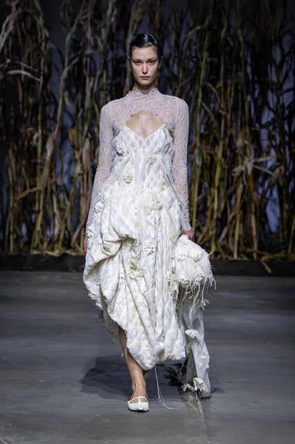 Inspired by the forms of birds, Pauline Dujancourt's dresses often included strips of wafer-thin fabric that wafted like wings as models strutted the runway.