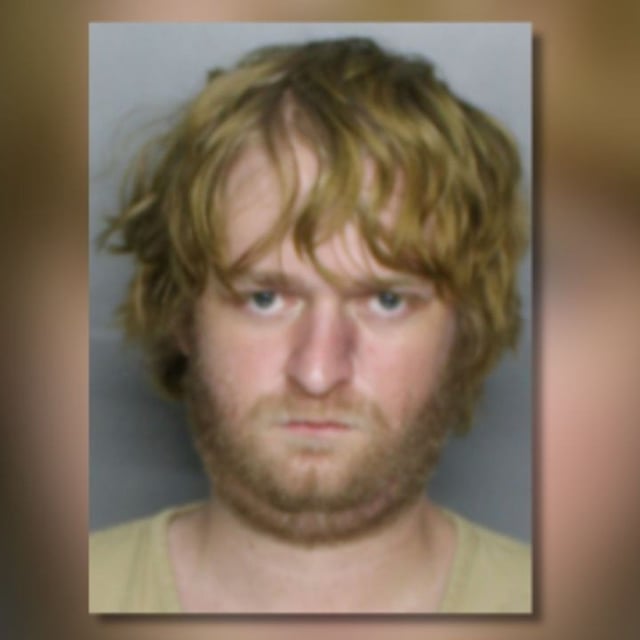 Blake Hoover, 31, has been accused of setting a synagogue on fire and defacing it with spray paint. (CCSO)