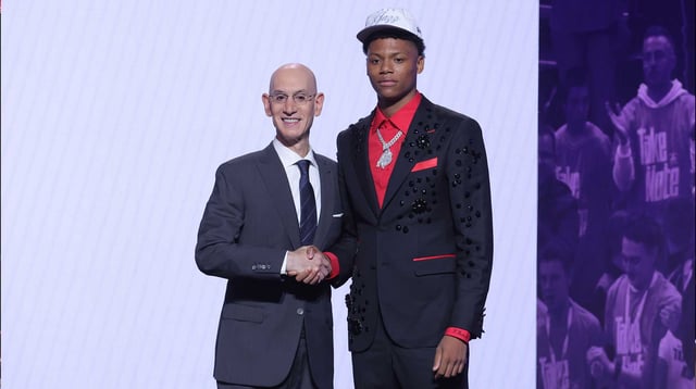 Jun 25, 2025; Brooklyn, NY, USA; Ace Bailey stands with NBA commissioner Adam Silver after being selected as the fifth pick by the Utah Jazz in the first round of the 2025 NBA Draft at Barclays Center. Mandatory Credit: Brad Penner-USA TODAY Sports