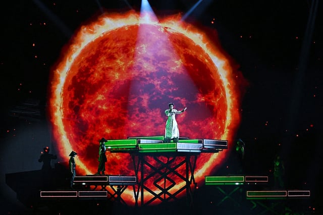 TOPSHOT - Vietnam's Duc Phuc performs during the Intervision Song Contest at the Live Arena in Moscow on September 20, 2025. With artists from 23 countries, hopes for a billion-plus viewers and a generous sprinkle of glitter, Russia hosts Intervision on September 20, 2025, a song contest championed by Moscow as a rival to Eurovision. (Photo by Olesya KURPYAYEVA / AFP) (Photo by OLESYA KURPYAYEVA/AFP via Getty Images)