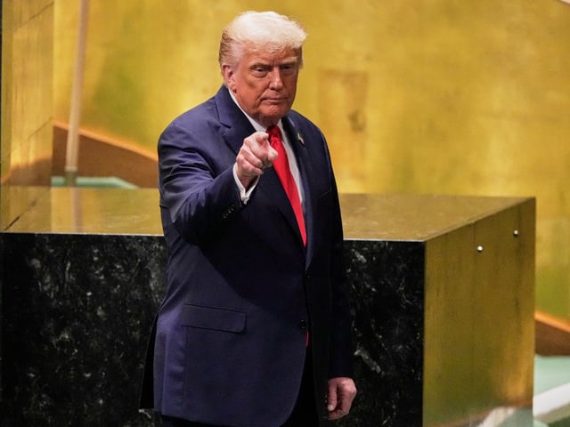 U.S. President Donald Trump gestures as he leaves after his address to the 80th session of the United Nations General Assembly, Tuesday, Sept. 23, 2025. (AP Photo/Richard Drew)