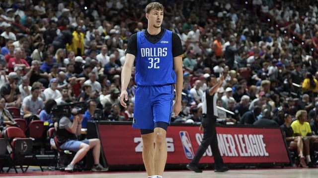Jul 12, 2025; Las Vegas, NV, USA; Dallas Mavericks forward Cooper Flagg (32) looks on during the first quarter of their game against the San Antonio Spurs at Thomas & Mack Center. Mandatory Credit: Candice Ward-Imagn Images
