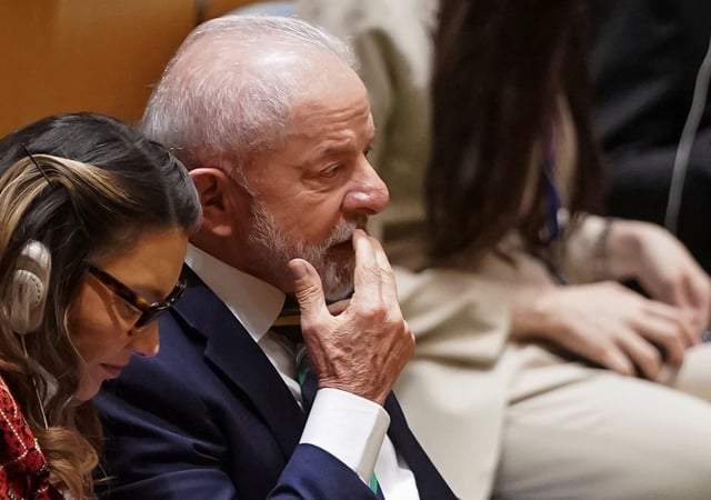 Brazil's President Luiz Inacio Lula da Silva reacts while listening to U.S. President Donald Trump's (not pictured) speech at the 80th United Nations General Assembly, in New York City, New York, U.S., September 23, 2025. REUTERS/Al Drago
