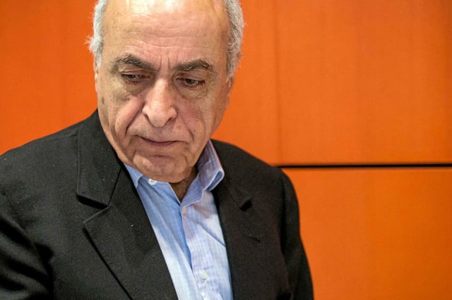 Ziad Takieddine à son arrivée au procès de l'affaire dite de Karachi, relative à du financement occulte de la vie politique française par rétrocommissions sur des marchés d'armement, au palais de justice de Paris, en octobre 2019. 
