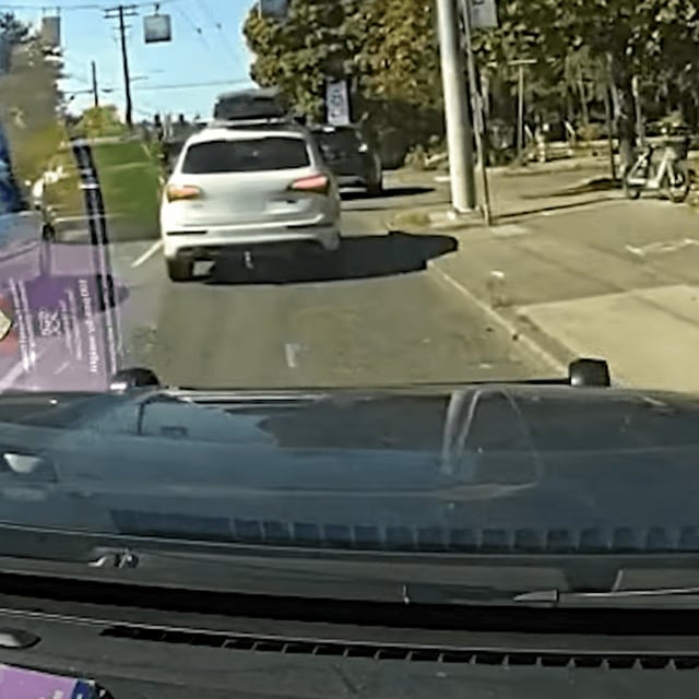 Seattle police{ }said a fleeing car jumped the gap on the partially lowered University District Bridge, went airborne, then landed on the other side of the bridge and continued north. (PHOTO: Seattle Police Department)