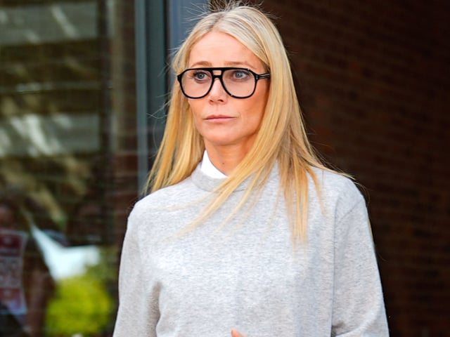 Gwyneth Paltrow arrived at Milan Fashion Week in capris, loafers, and a blue Goyard bag