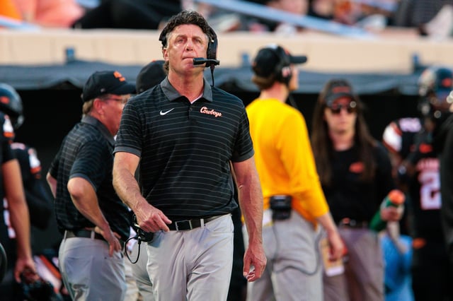 Sep 19, 2025; Stillwater, Oklahoma, USA; Oklahoma State Cowboys coach Mike Gundy on the sidelines during the first half against the Tulsa Golden Hurricane at Boone Pickens Stadium. Mandatory Credit: William Purnell-Imagn Images/File photo