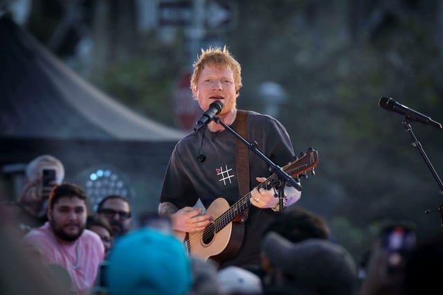 Singer-songwriter Ed Sheeran performs during "Ed Sheeran's Play: Live from New York" presented by TikTok at Domino Square in the Brooklyn borough of New York, on Saturday, Sept. 13, 2025. (Photo by Andy Kropa/Invision/AP)