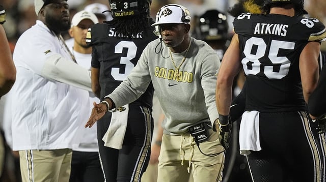 Sep 20, 2025; Boulder, Colorado, USA; Colorado Buffaloes head coach Deion Sanders celebrates a touchdown with his players in the fourth quarter against the Wyoming Cowboys at Folsom Field. Mandatory Credit: Ron Chenoy-Imagn Images