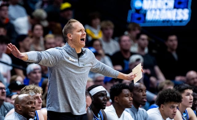 BYU Cougars head coach Kevin Young calls out during a second-round college basketball game in the NCAA Tournament against the Wisconsin Badgers held at Ball Arena in Denver, Colo., on Saturday, March 22, 2025.
