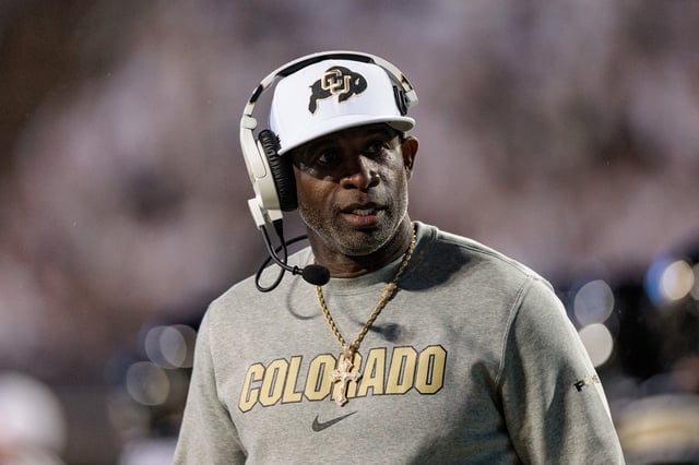 Head coach Deion Sanders of the Colorado Buffaloes walks the sideline during the first quarter against the Wyoming Cowboys at Folsom Field on September 20, 2025 in Boulder, Colorado.