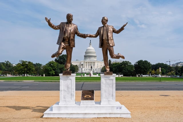 A work of protest art representing President Donald Trump and Jeffrey Epstein is seen on the National Mall near the Capitol in Washington, Tuesday, Sept. 23, 2025. (AP Photo/J. Scott Applewhite)