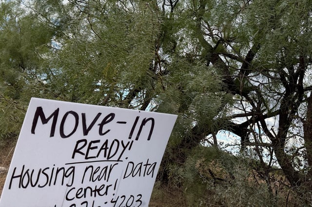 A sign advertises housing for workers along the road to the Stargate artificial intelligence data center complex on Monday, Sept. 22, 2025. (AP Photo/Matt O'Brien)