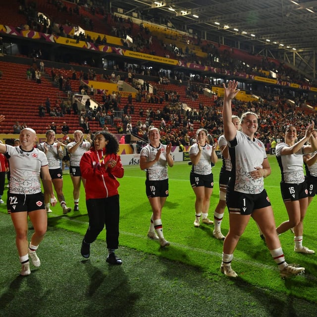 Canada's team players celebrate after winning the Women's Rugby World Cup 2025 semifinal match between New Zealand and Canada in Bristol, England, Friday, Sept. 19, 2025. (AP Photo/Anthony Upton)