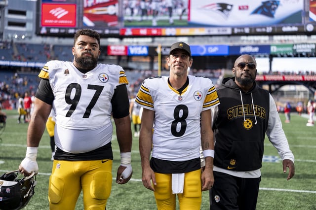 Cameron Heyward #97 of the Pittsburgh Steelers Aaron Rodgers #8 of the Pittsburgh Steelers and Head coach Mike Tomlin of the Pittsburgh Steelers walks off the field during an NFL football game against the New England Patriots at Gillette Stadium on September 21, 2025 in Foxborough, Massachusetts.