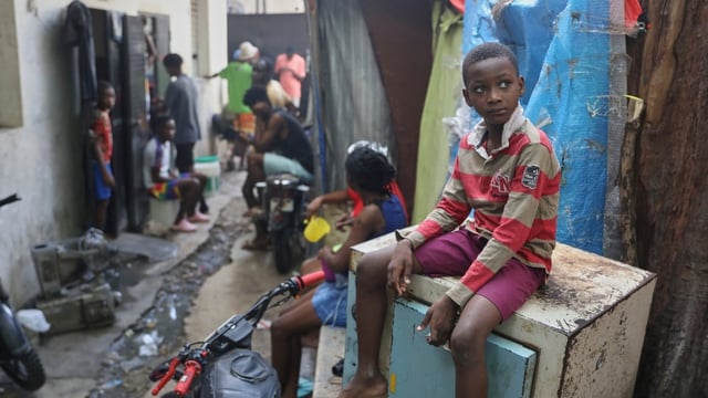 People displaced by gang violence are seen living at the Ministry of Public Works, Transport and Communications office converted into a shelter in Port-au-Prince, Haiti, earlier this month.