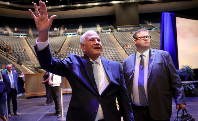 Elder Ronald A. Rasband of the Quorum of the Twelve Apostles of The Church of Jesus Christ of Latter-day Saints waves to the crowd after giving a BYU devotional at the Marriott Center in Provo on Tuesday, Sept. 23, 2025.