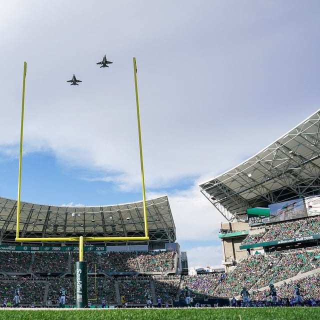 Royal Canadian Air Force CF-18 fighter jets fly over Mosaic Stadium before CFL football action between the Saskatchewan Roughriders and the Winnipeg Blue Bombers in Regina, Sunday, Aug. 31, 2025. THE CANADIAN PRESS/Heywood Yu