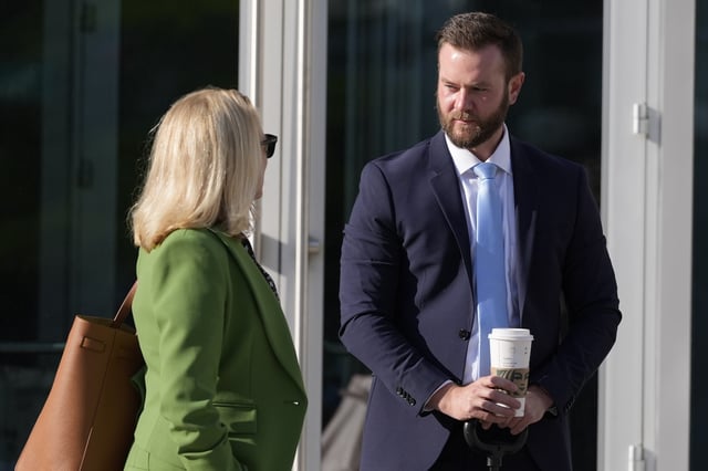 FILE - Cade Cothren, the former chief of staff to former Tennessee House Speaker Glen Casada, right, arrives at the federal courthouse with his attorney Cynthia Sherwood, left, Monday, April 28, 2025, in Nashville, Tenn. (AP Photo/George Walker IV, File)